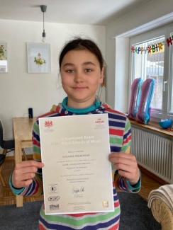 Pupil with with certificate
