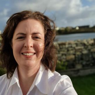 Olwen Macleod smiling on island