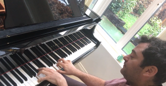 Ben Singer playing the piano