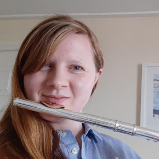 An image of Erin Sproston who teaches the flute online with Your Space Music Lesson