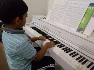 online piano pupil taking lessons with Your Space Music Lessons